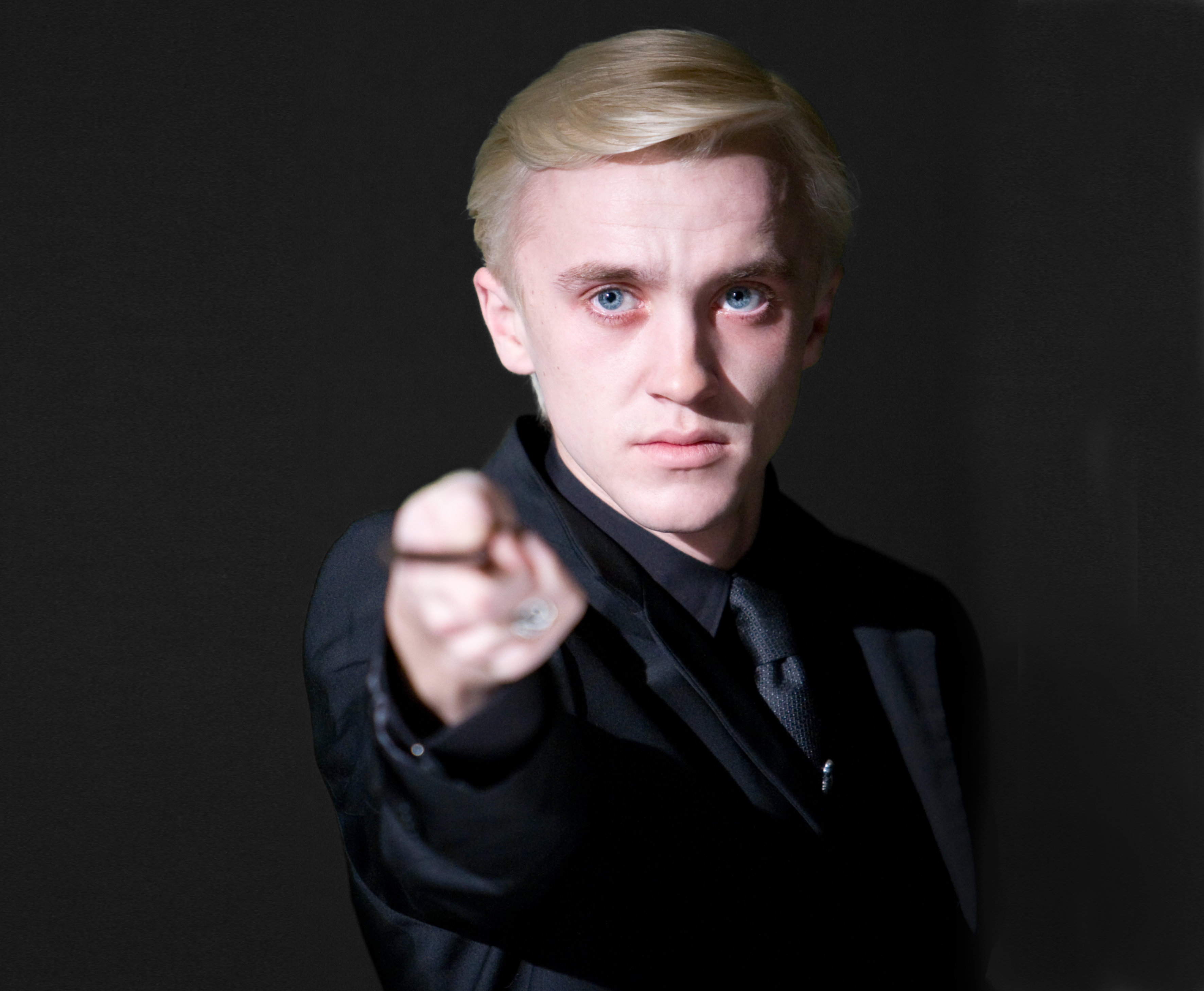Draco Malfoy points his wand in an official still from Harry Potter and the Half-Blood Prince