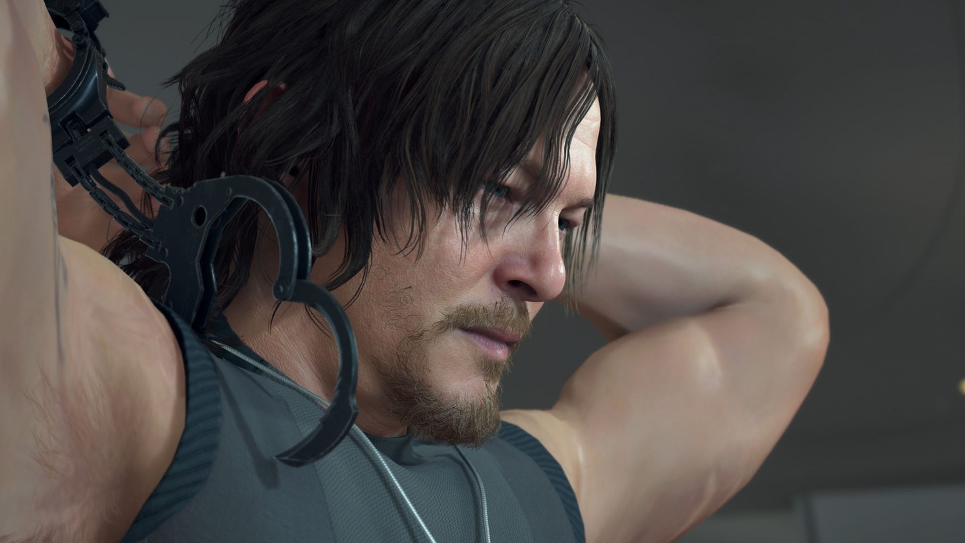 Sam Porter Bridges equipado com o scanner Odradek em Death Stranding